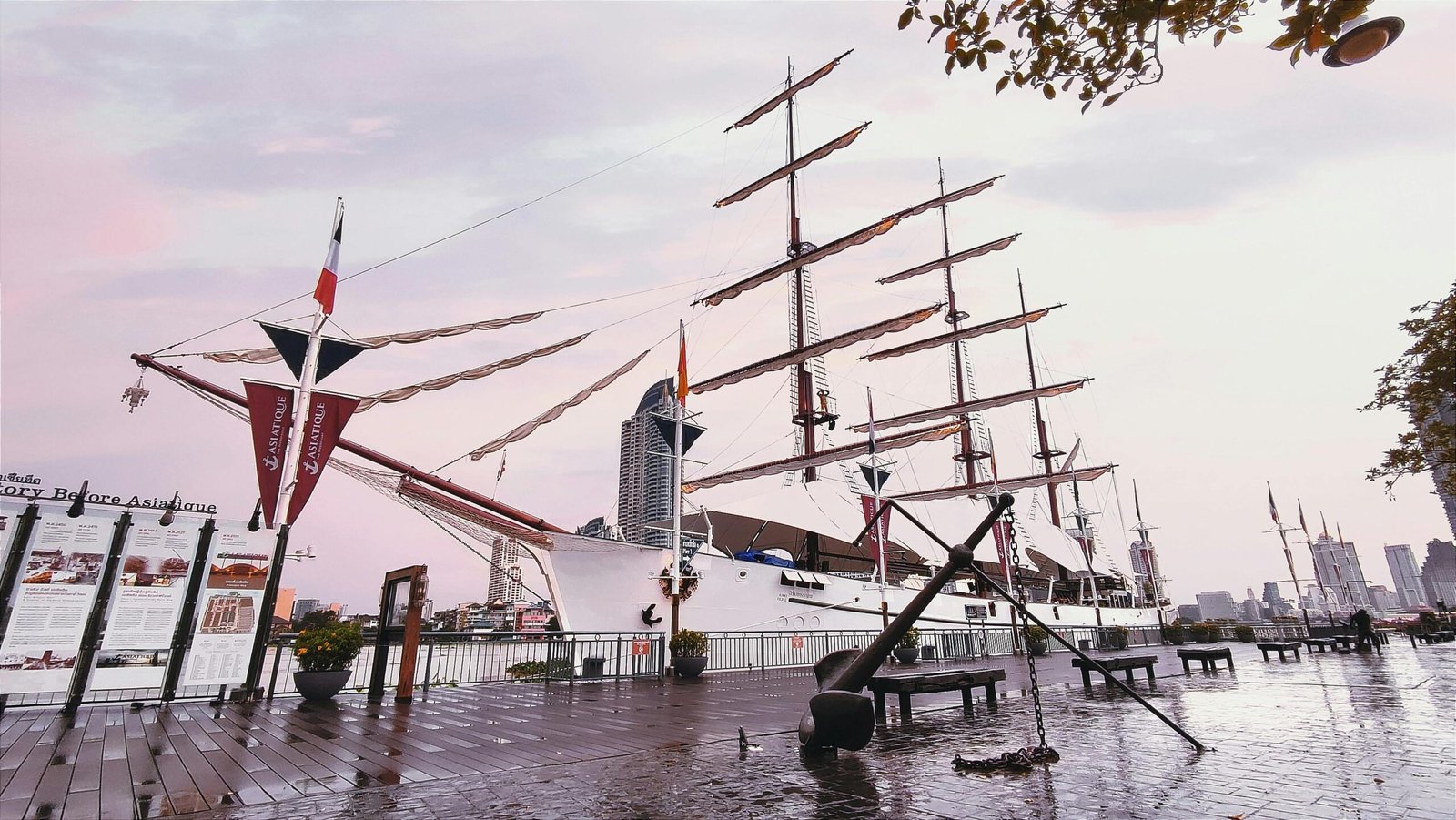 Boat docked in the harbor in front of Asiatique.
