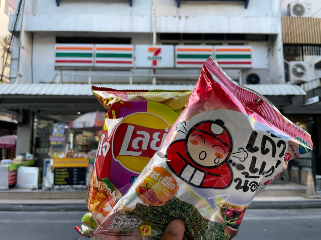 holding-snacks-in-front-of-7-eleven-store