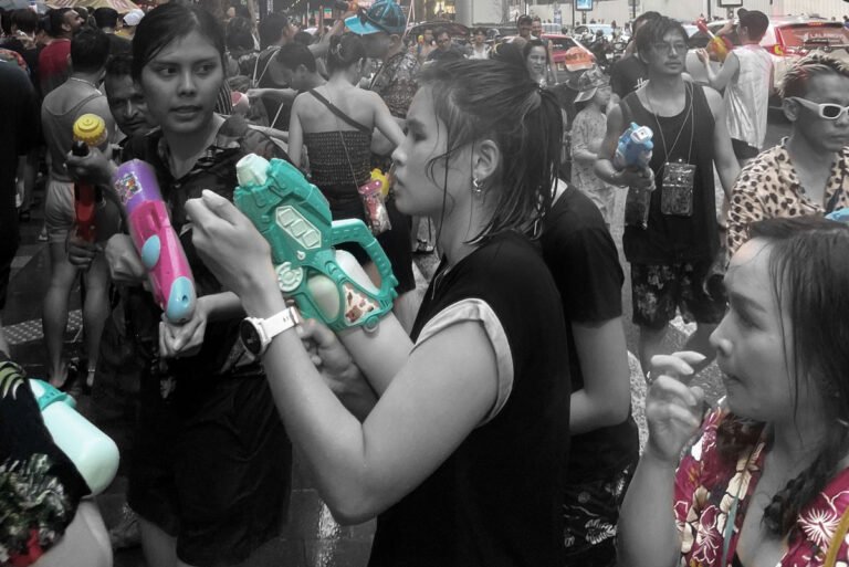 People with water guns songkran bangkok 1 768x513