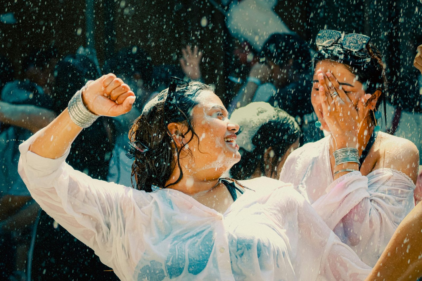 women getting splashed with water during Songkran Festival