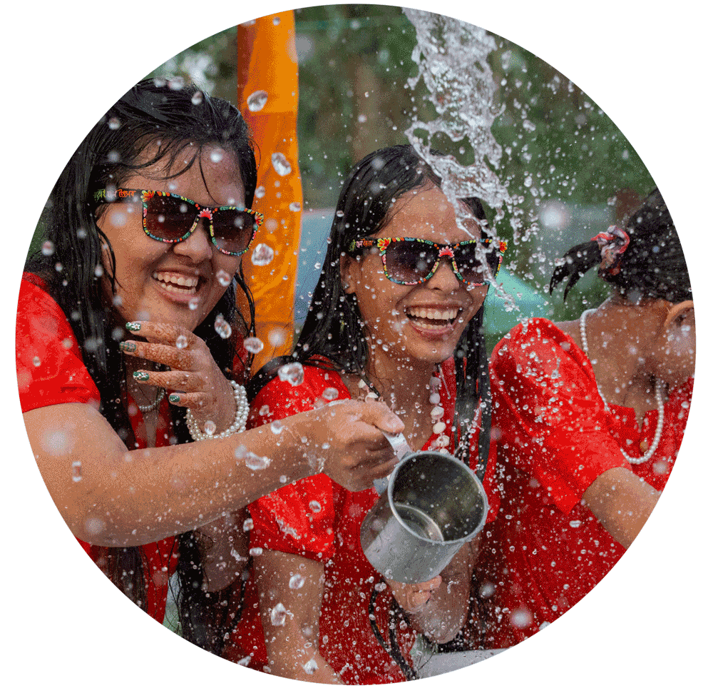 women playing in water during Songkran celebration Bangkok